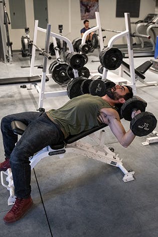 Sam Elias performing dumbbell fly