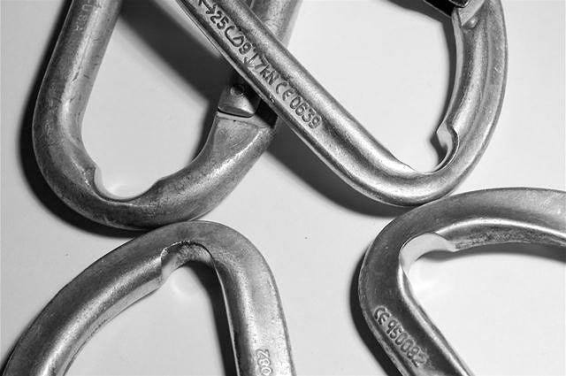 close-up of a few carabiners with sharp edges