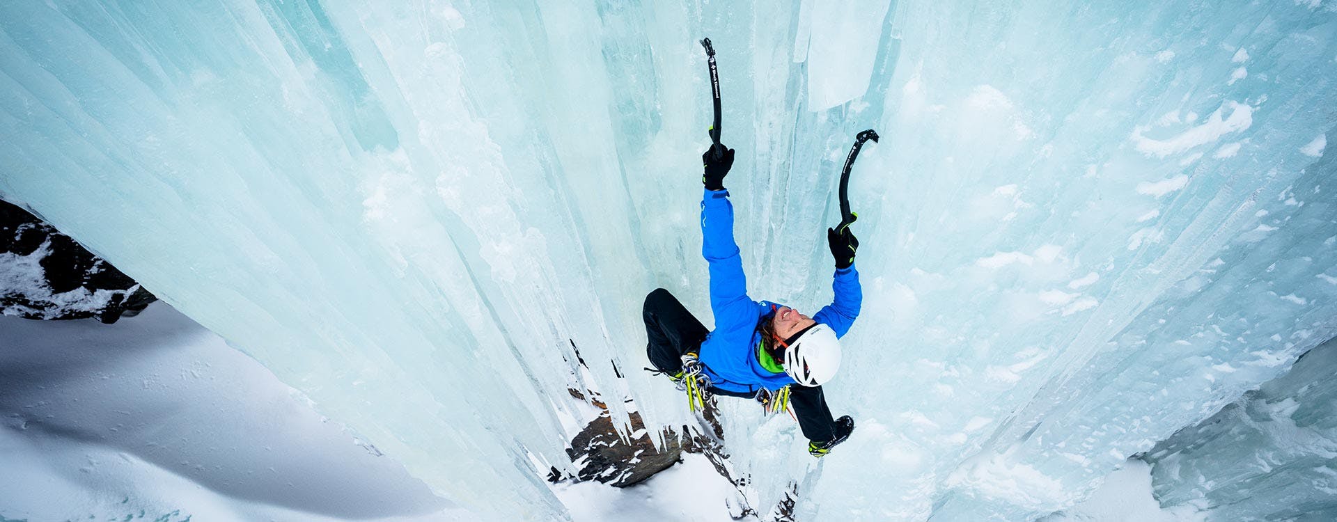 Man climbing an ice route