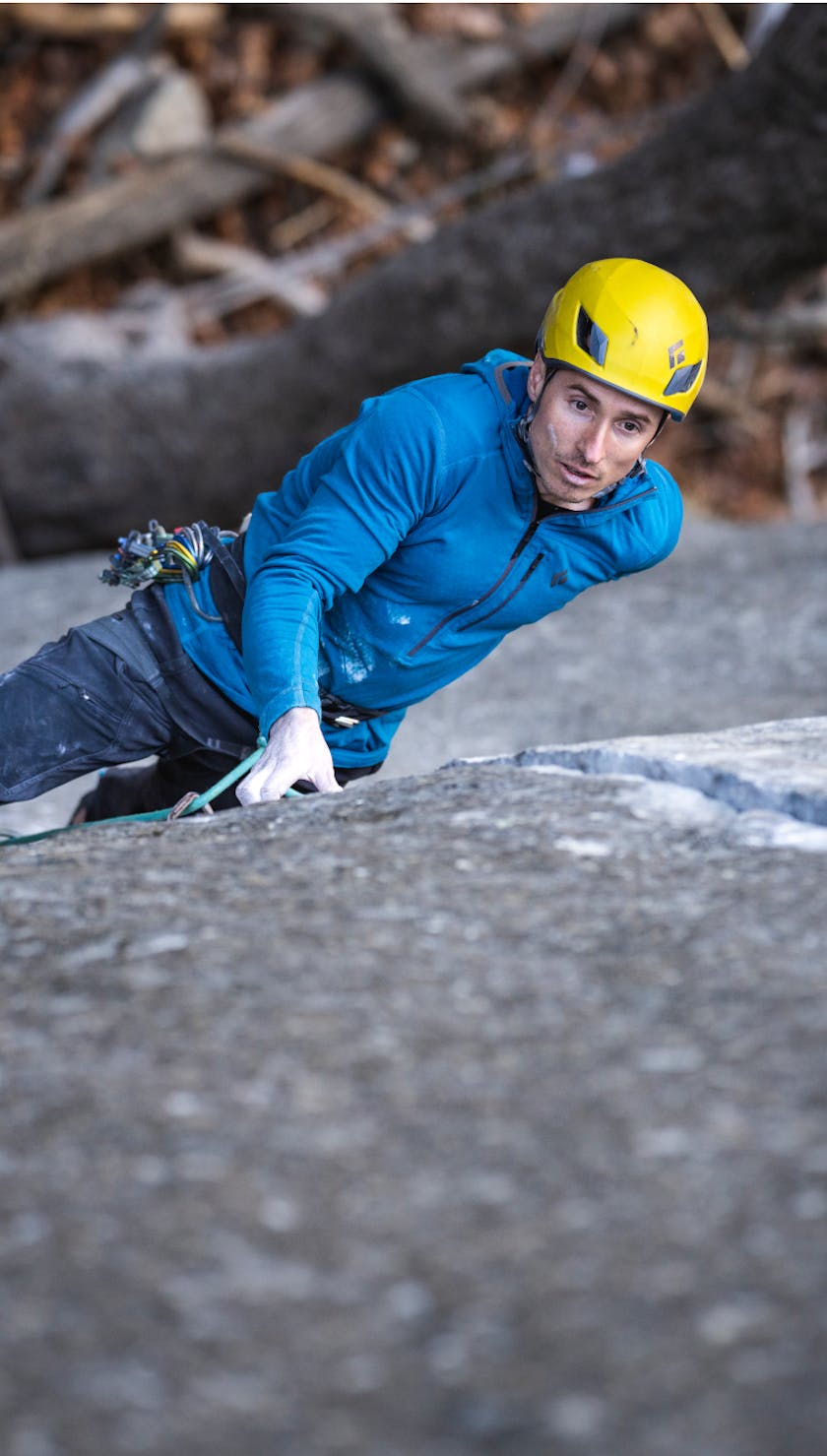 Black Diamond athlete Carlo Traversi climbs in the Coefficient hoody.