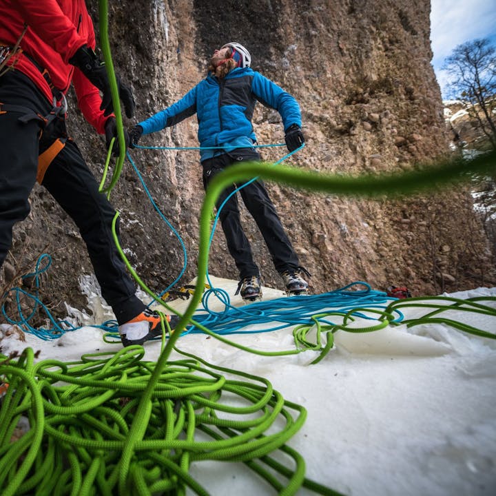 Photograph by Andy Earl of Jackson Marvell preparing to ice climb