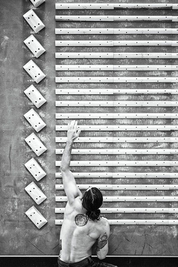 Sam Elias training on a hangboard