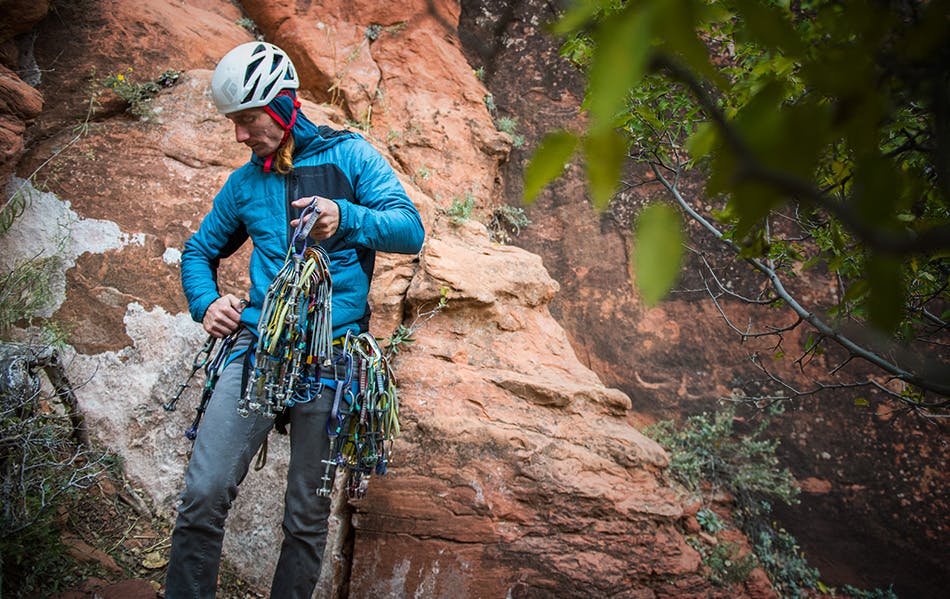 Photograph by Andy Earl of Big Wall Paul with rock climbing gear.