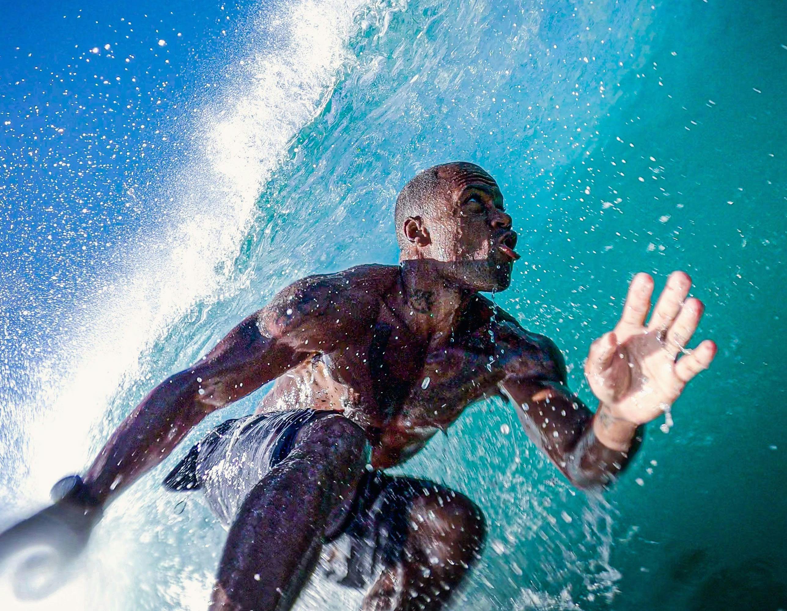King surfs a wave
