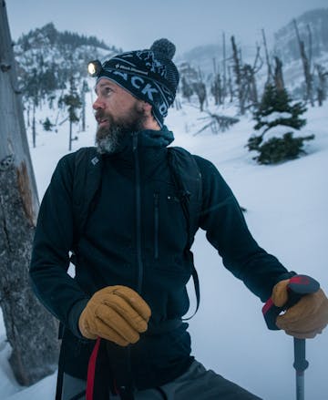 A backcountry skier wearing the Black Diamond Coefficient Fleece hoody.