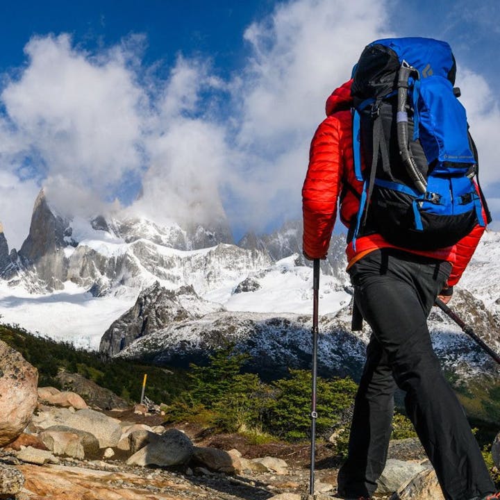 Photograph by Ted Hesser of man trekking in mountains | Trekking Packs | Hiking Packs