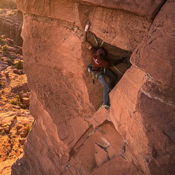 Jackson Marvell climbing rock
