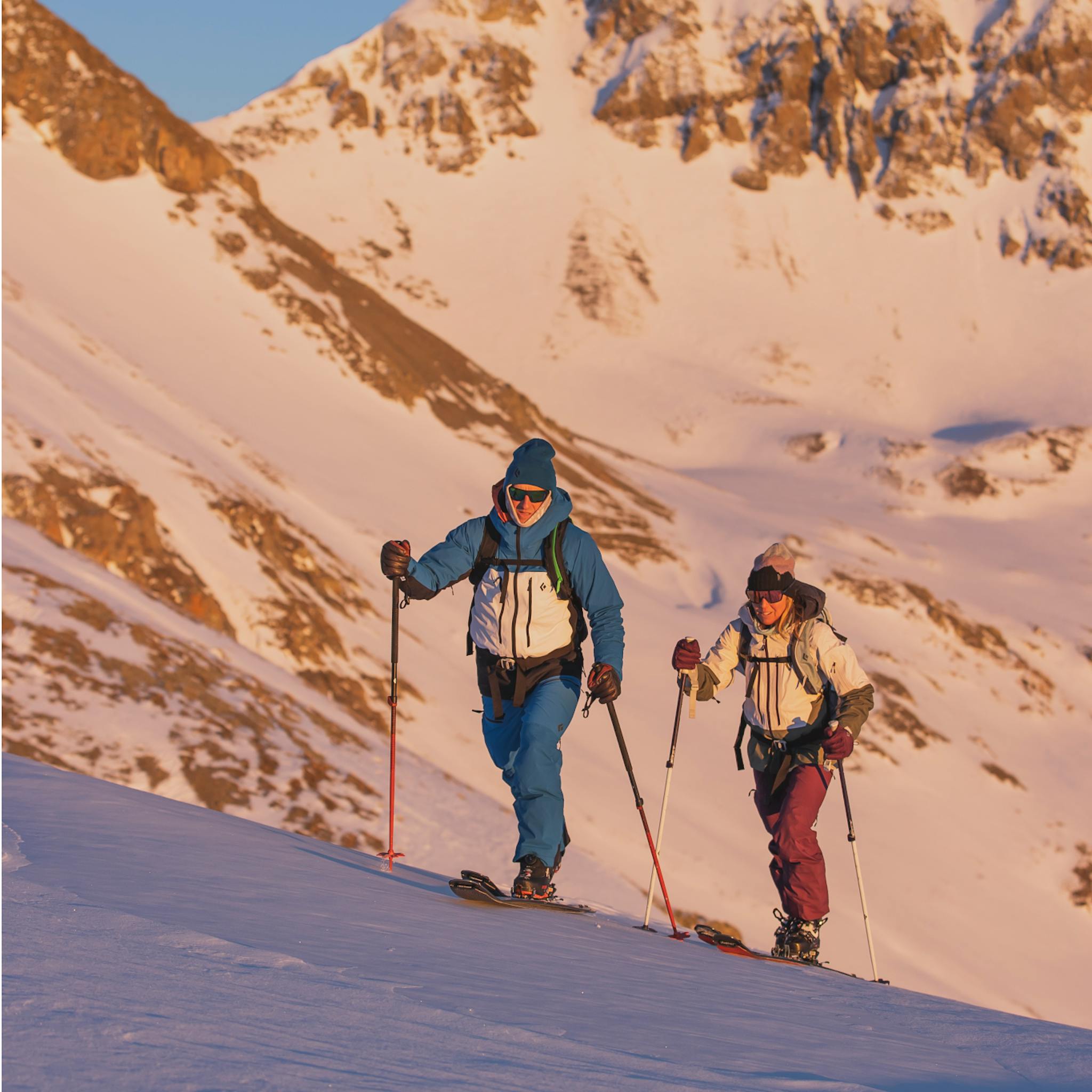 Two backcountry skiers out for a dawn patrol.
