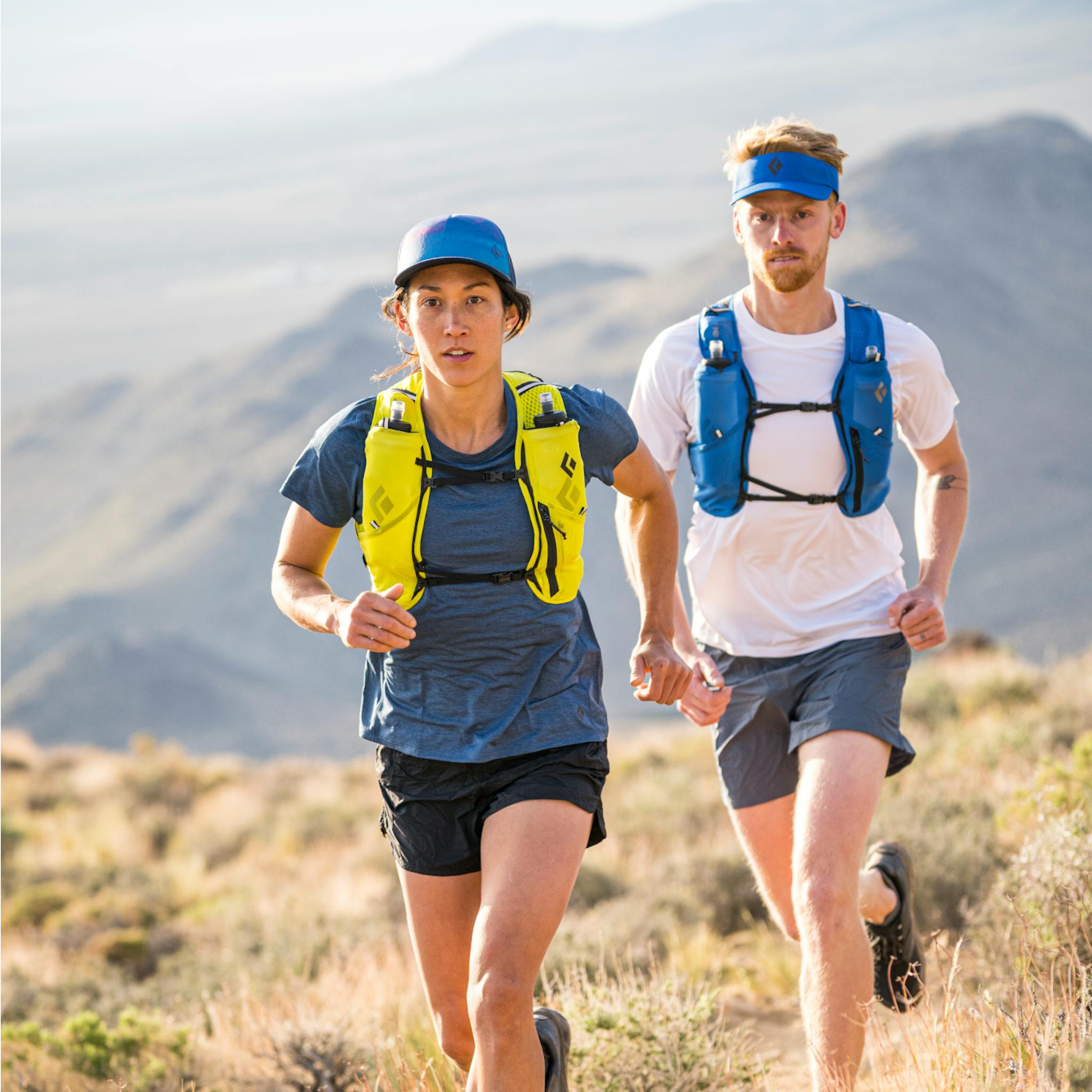 Two Trail runners wearing the Black Dimond Lightwire Tech Tee.