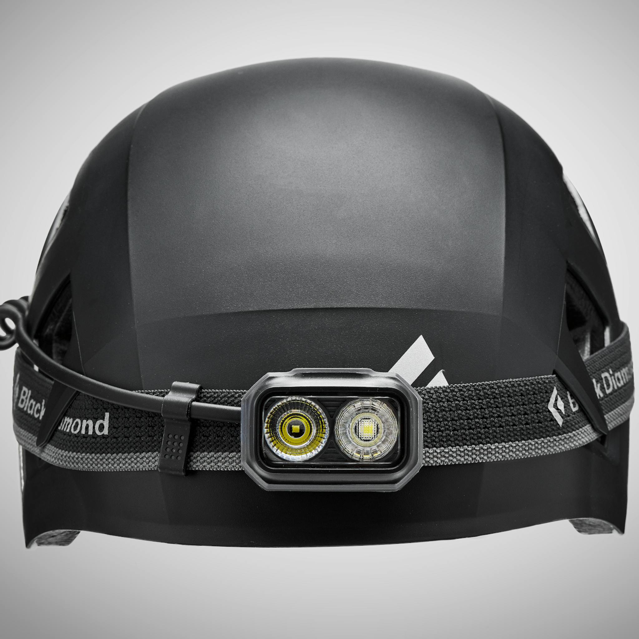 A front view of the Capitan MIPS with a headlamp on the helmet.