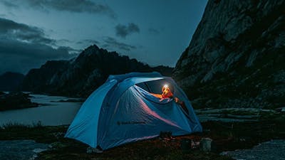 Tent illuminated by a headlamp