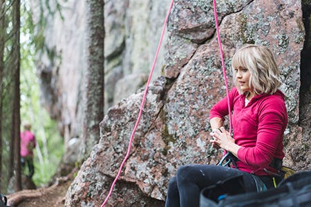 climber taking a rest on a climb