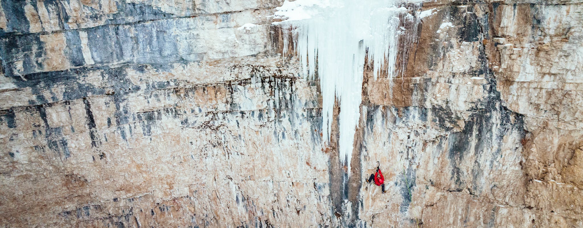 Black Diamond Athlete Aaron Mulkey climbing ice in Wyoming. 