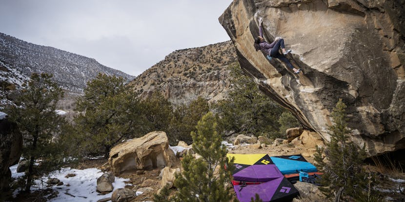 Black Diamond Athlete Natalia Grossman bouldering outside.