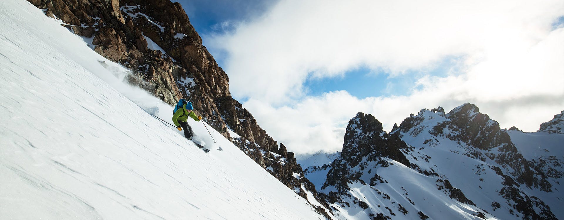 man skiing downhill