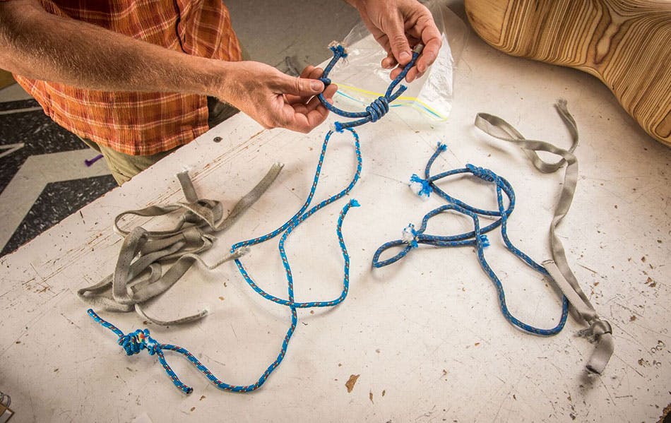 engineer reviewing the tested webbing and cord