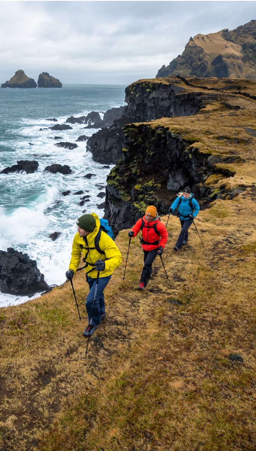 Three hikers in Iceland wearing Black Diamond technical stretch rain shells.