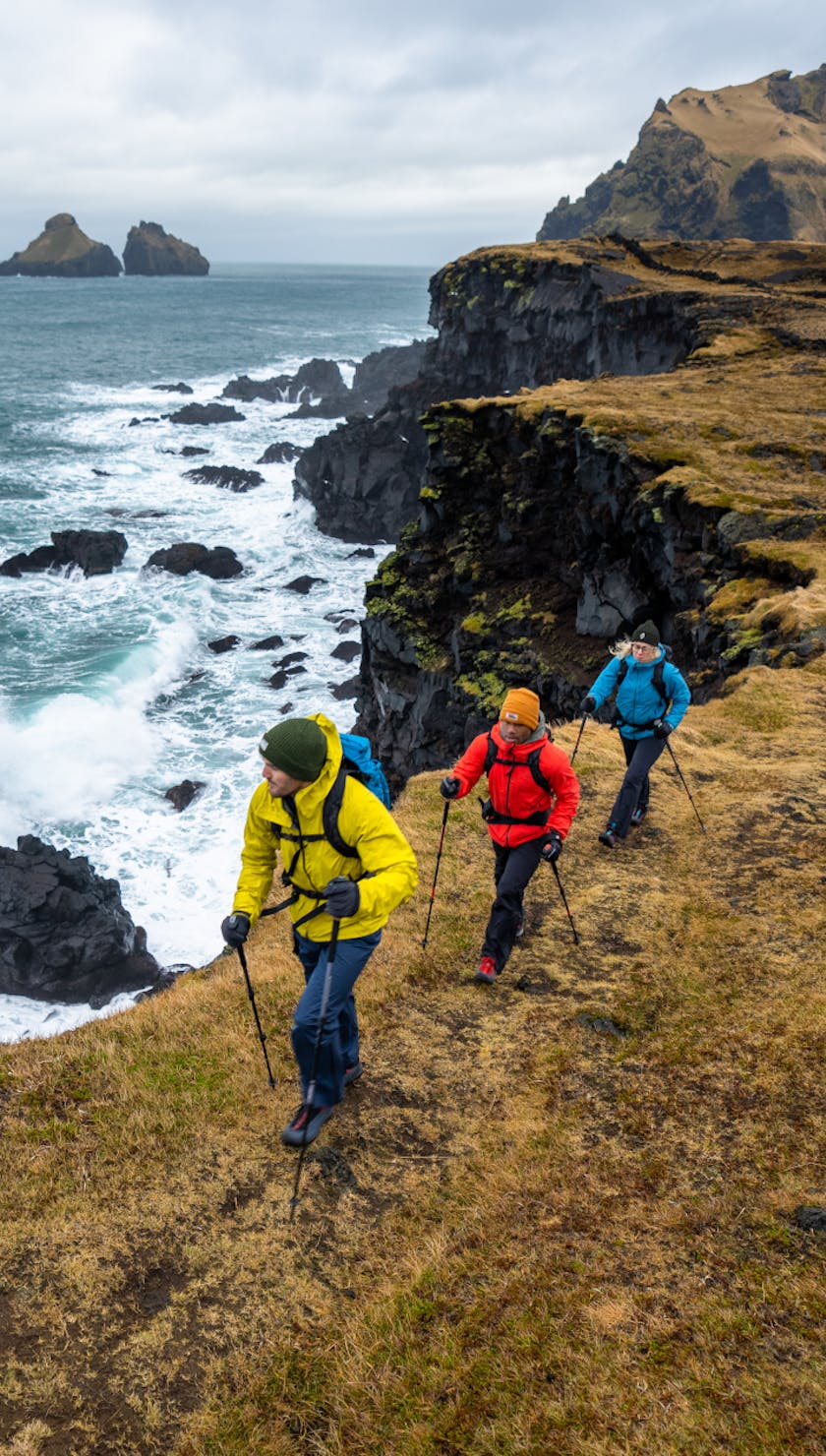 Three hikers in Iceland wearing Black Diamond technical stretch rain shells.