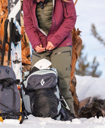 The Black Diamond Dawn patrol back Pack and Women's Recon LT pants.