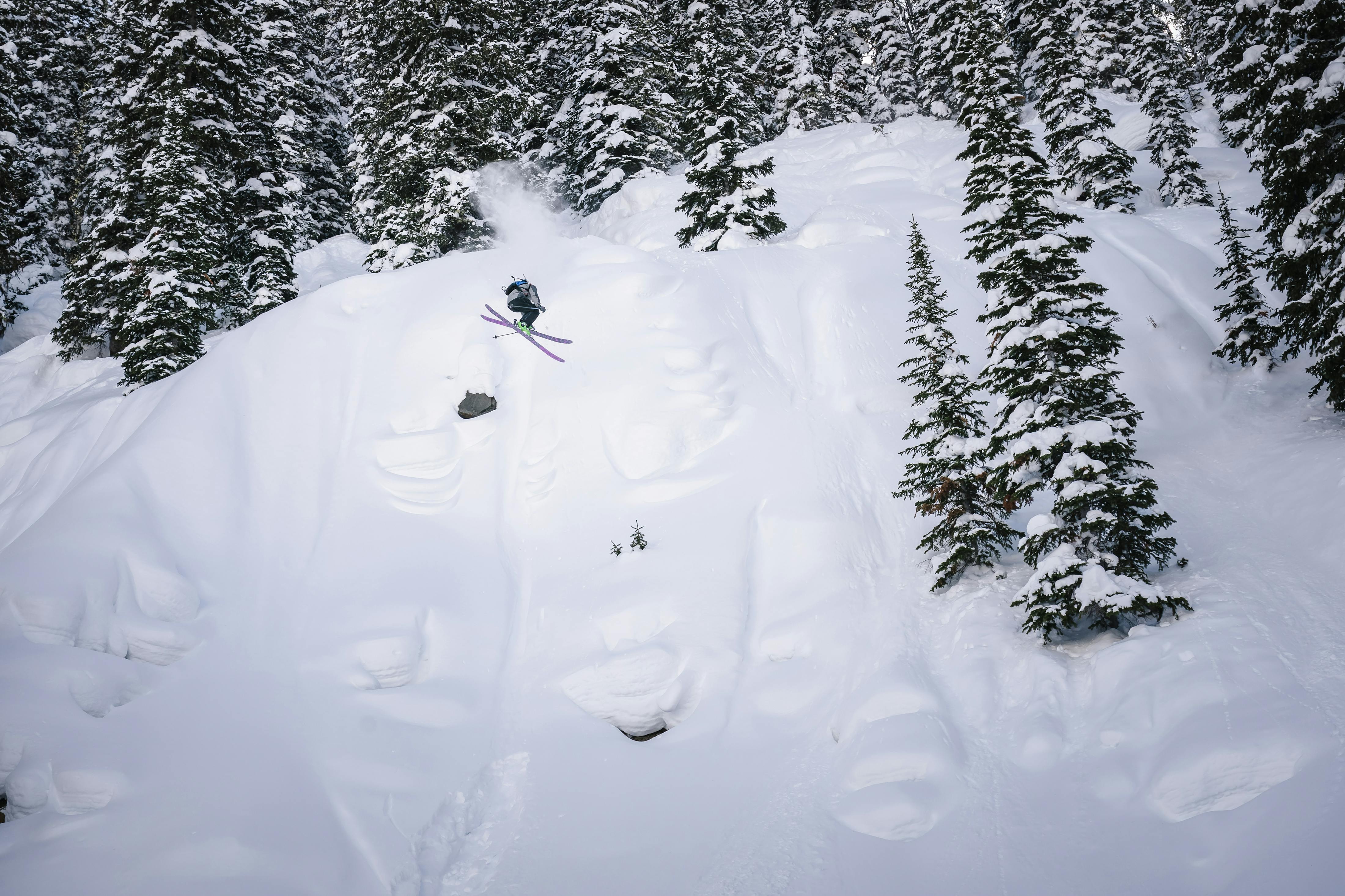 Black Diamond athlete Isaac Freeland sending a cliff drop in the backcountry.