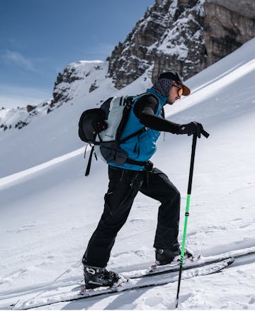 Friend of Black Diamond skinning in the Recon LT Ski Pants.