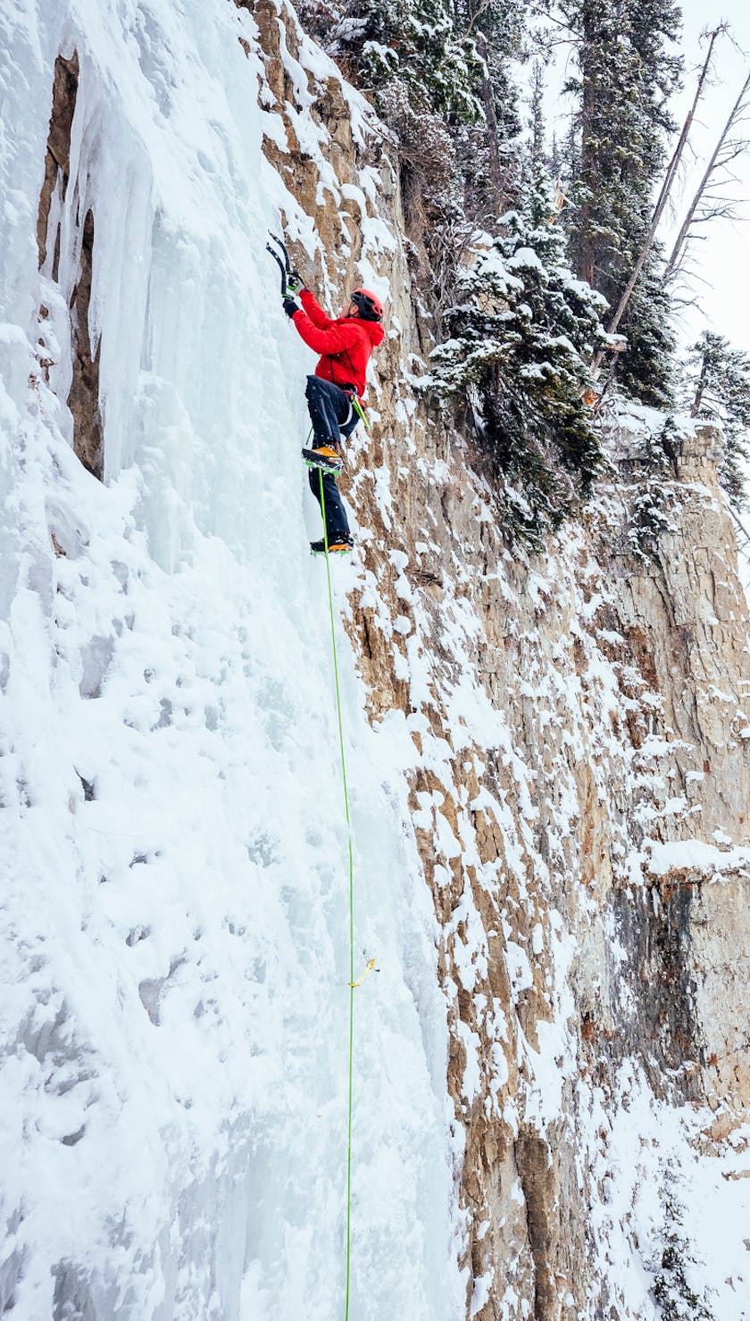 Black Diamond Athlete Aaron Mulkey ice climbing in Wyoming. 