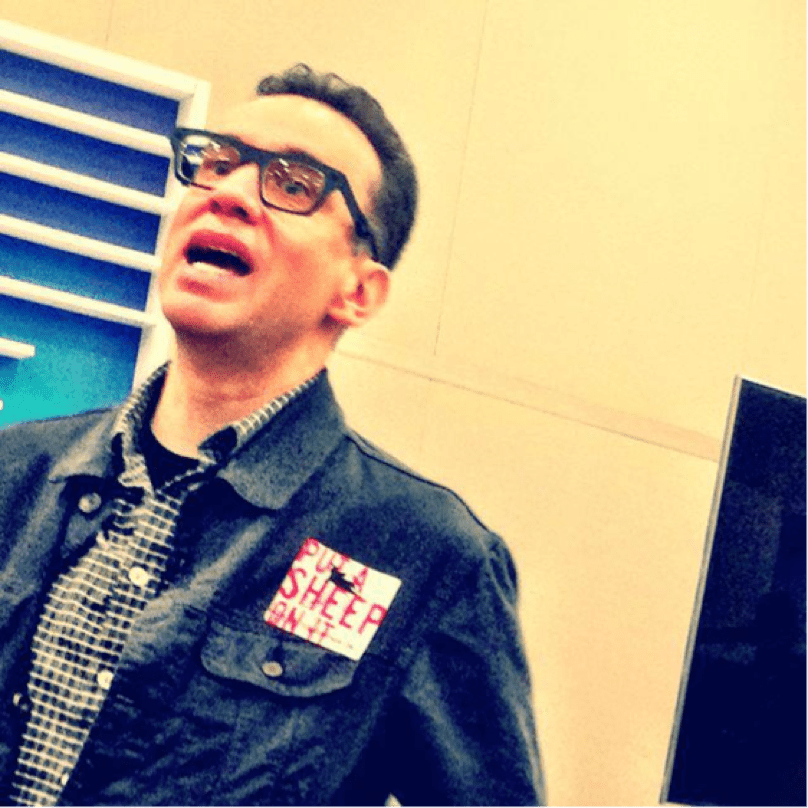 Fred Armisen wearing a Black Sheep sticker