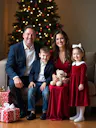 Christmas photoshoot pic of a family 