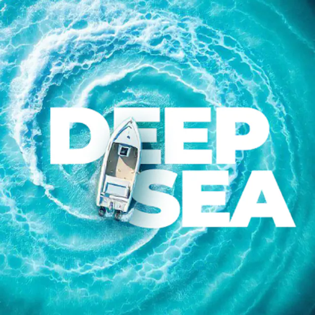 Text behind image feature showcasing a boat in an ocean and Deep Sea written below