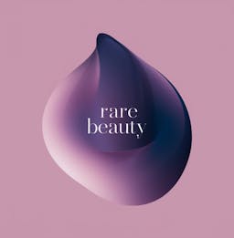 Abstract logo for Rare Beauty brand, shaped like a purple droplet