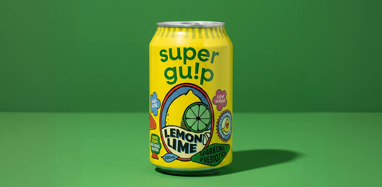 A Studio shot of a drink with a green color background