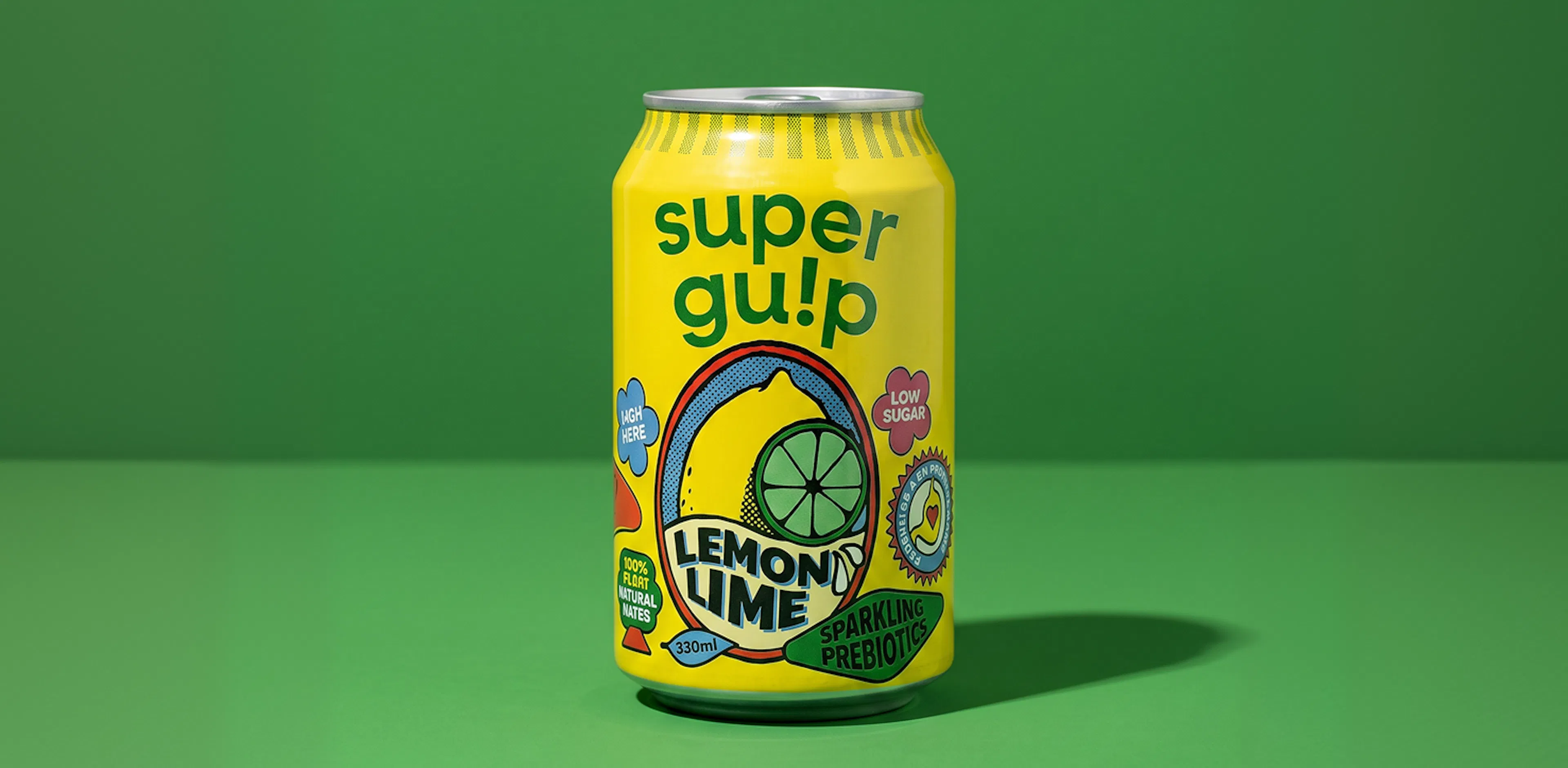 A Studio shot of a drink with a green color background