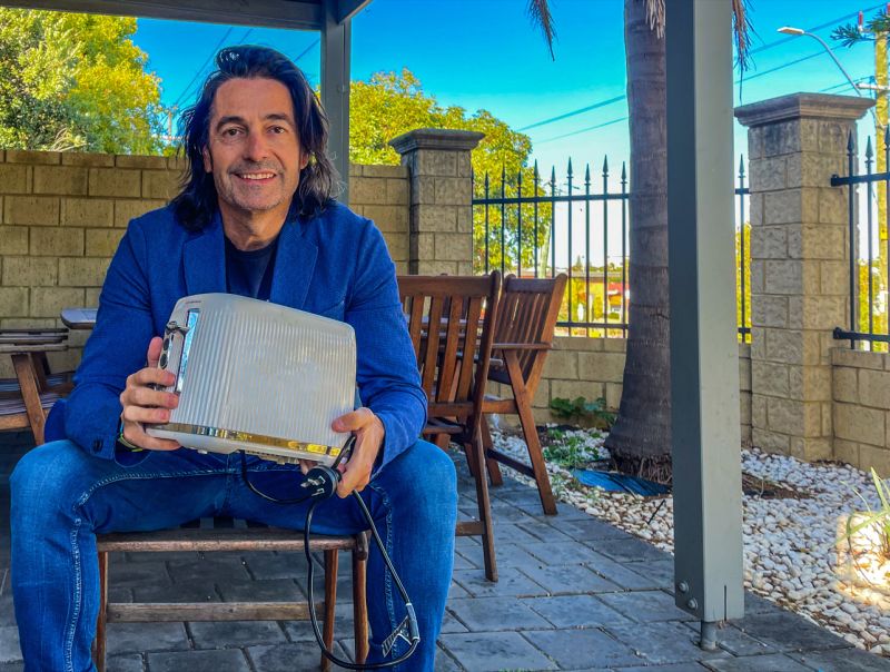 Stuart Kidd, founder of Blezz, holding a Sunbeam toaster he adopted