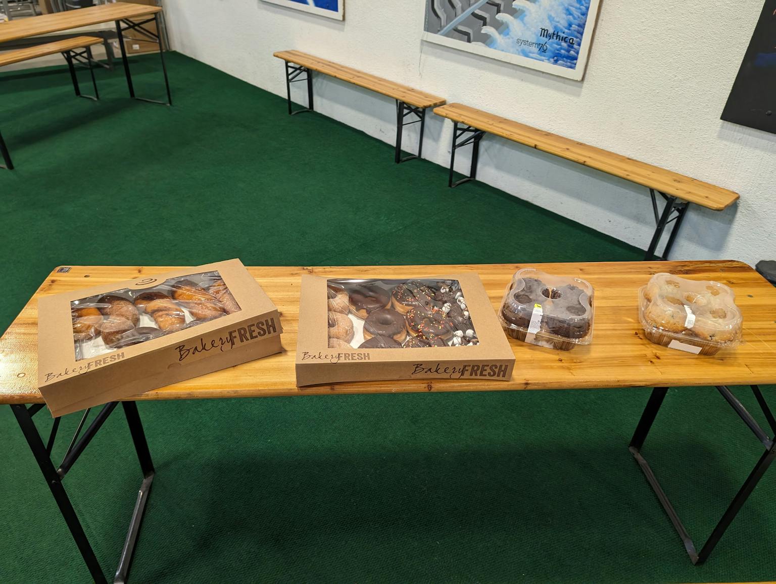 table with donuts and muffins