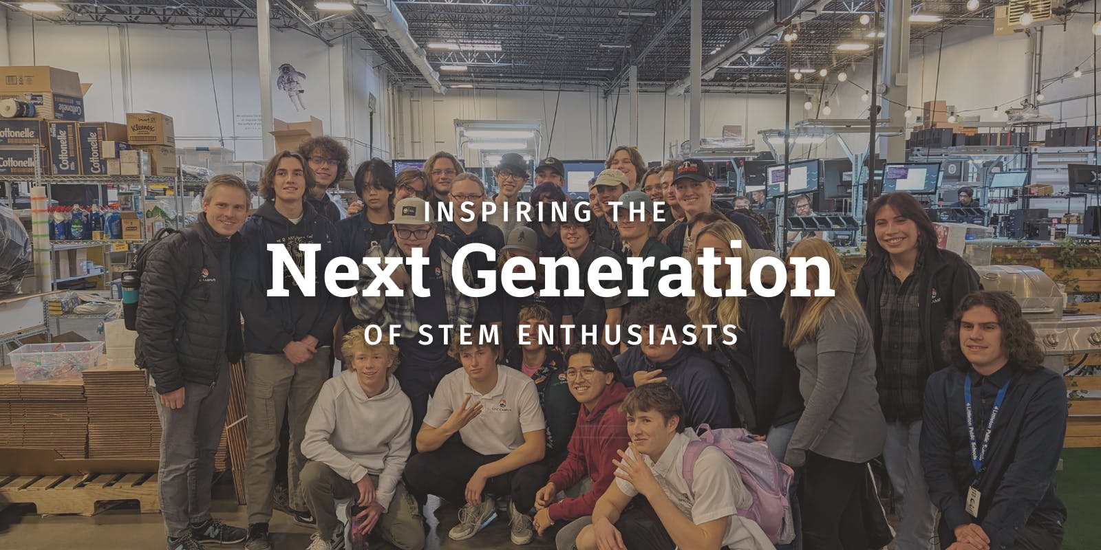 Group photo with text that reads Inspiring the next generation of stem enthusiasts