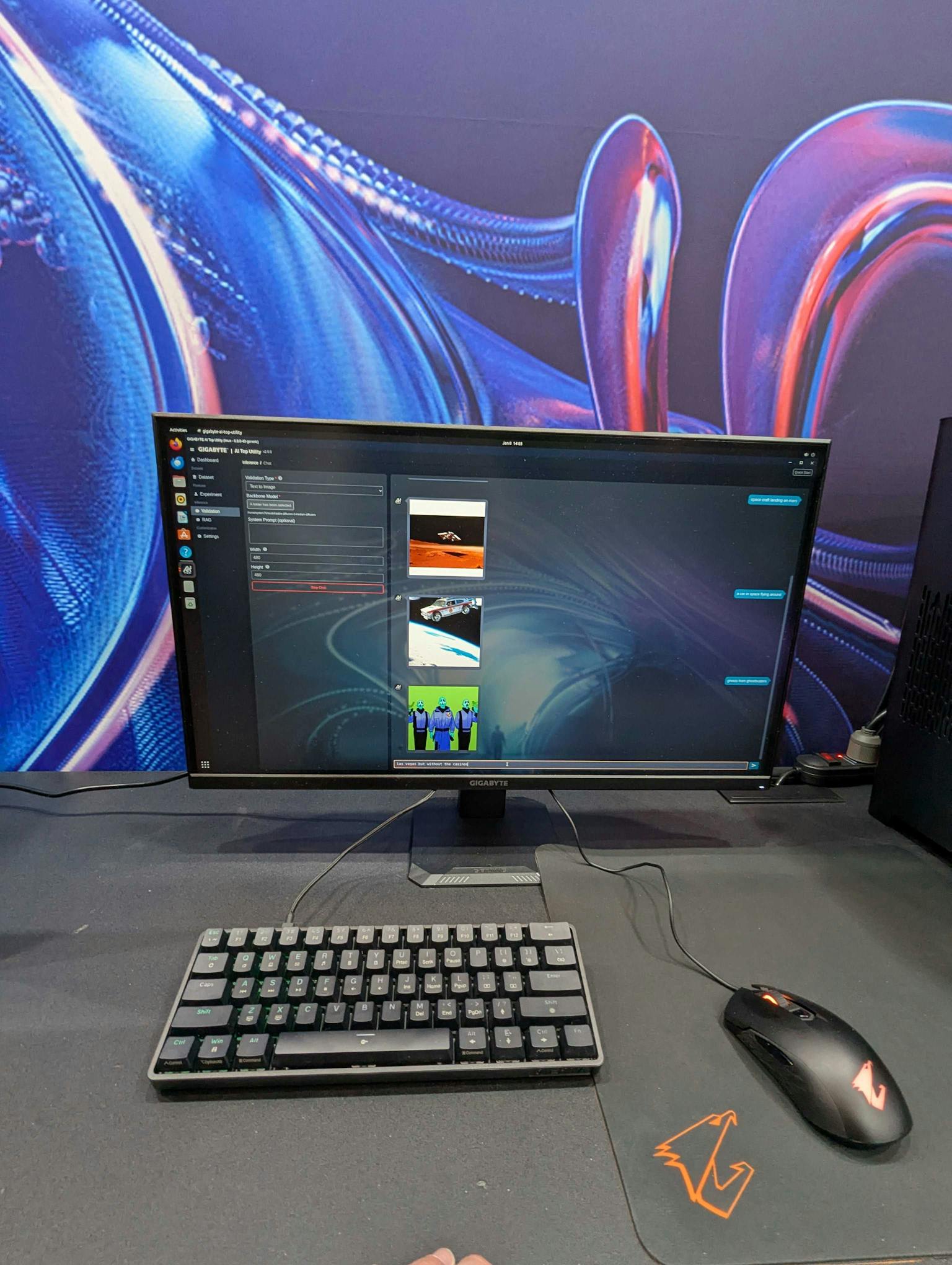 Photo of text prompts and short videos on a monitor connected to Thelio Mega at CES.