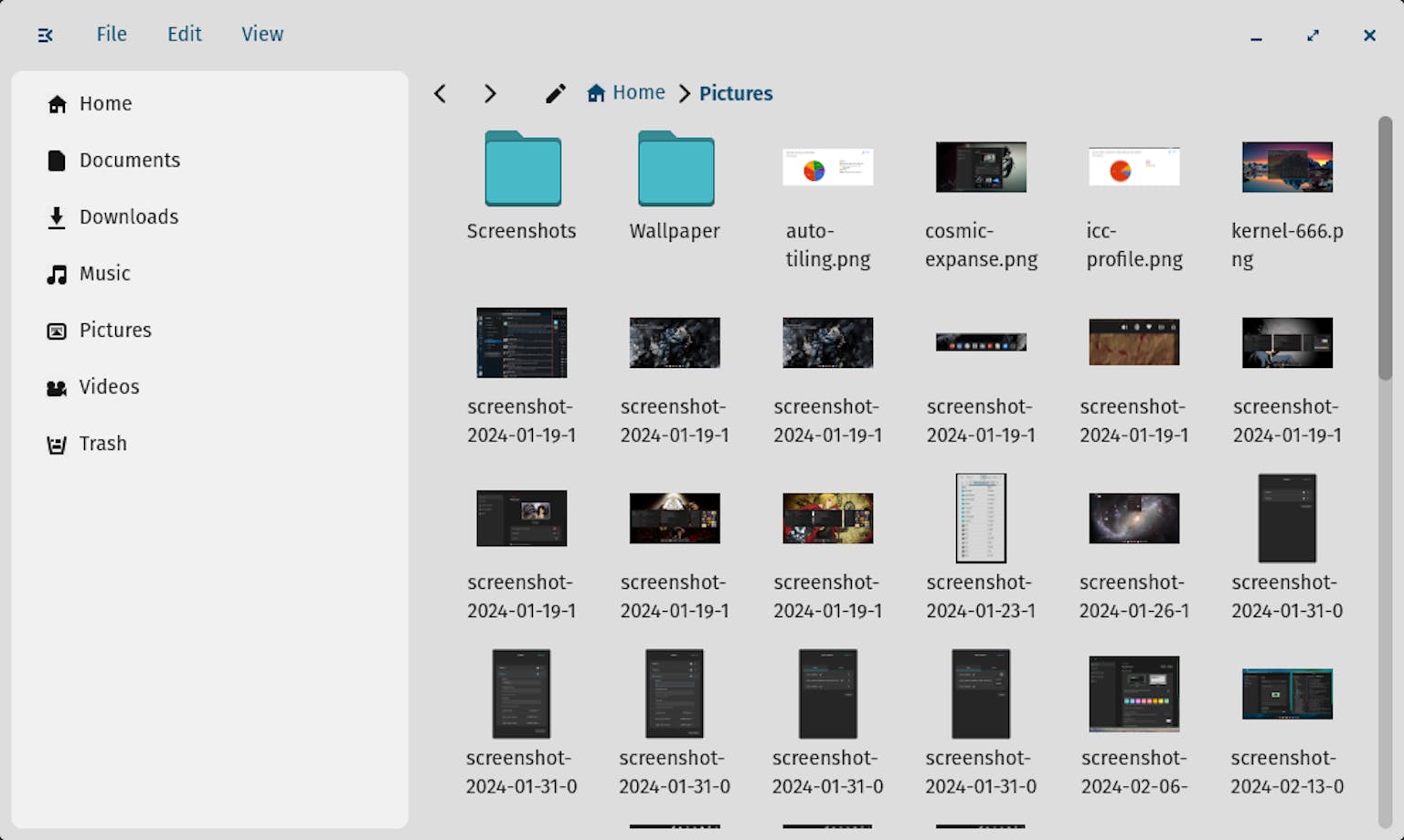 The current implementation of the COSMIC Files file manager in Grid View.