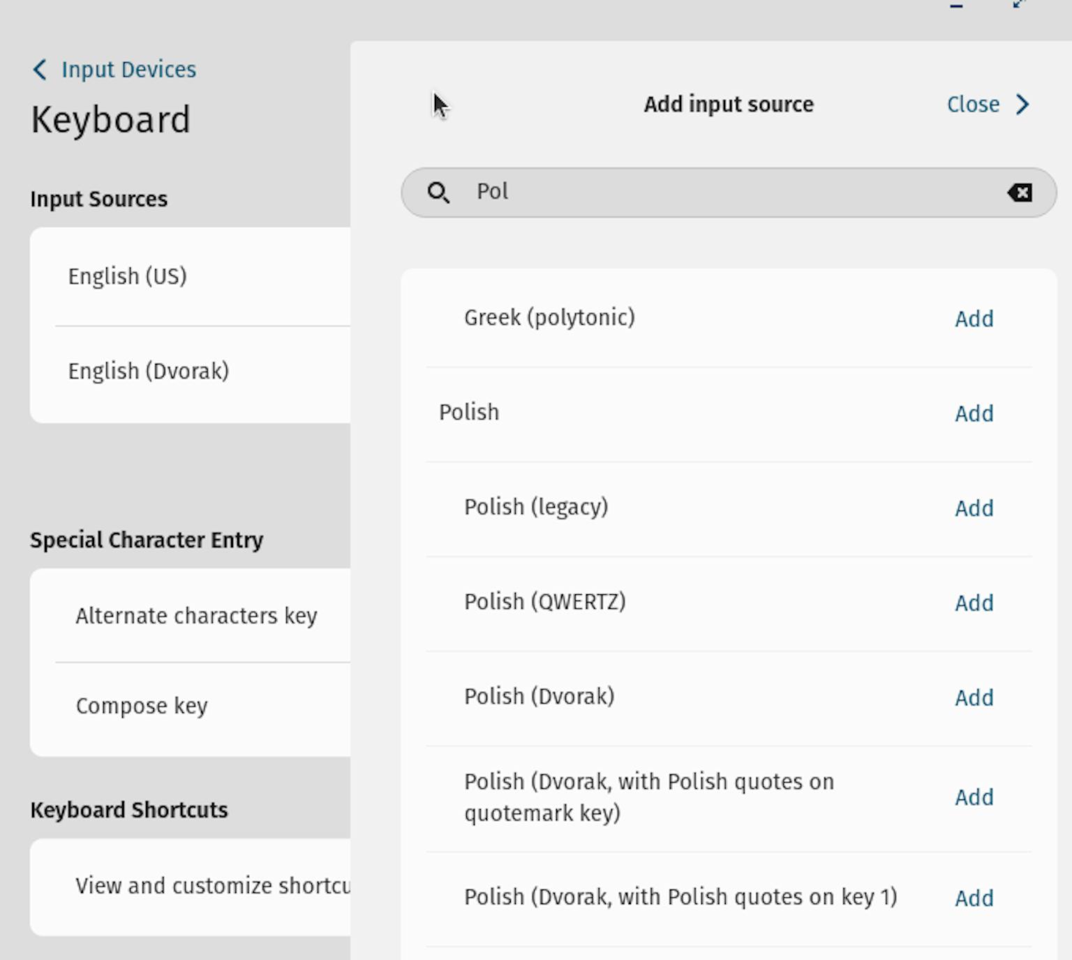 Keyboard input sources are being searched, with Polish keyboard options being displayed when searching “Pol”.