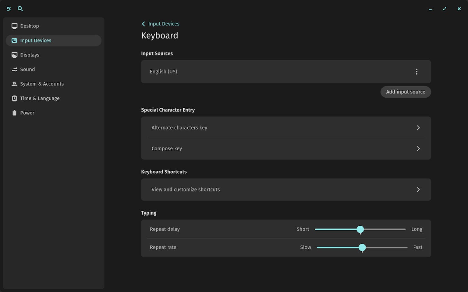 Two sliders in Keyboard Settings are shown, allowing the user to shorten or lengthen the keyboard repeat delay, as well as make the repeat rate slower or faster.