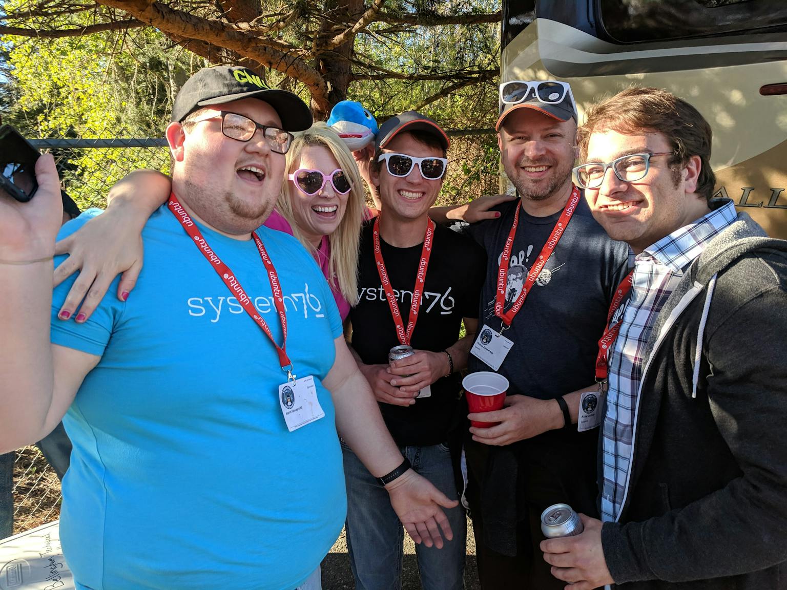 group photo at LinuxFest Northwest. From left, Aaron, Emma, Levi, Thomas and Alex.