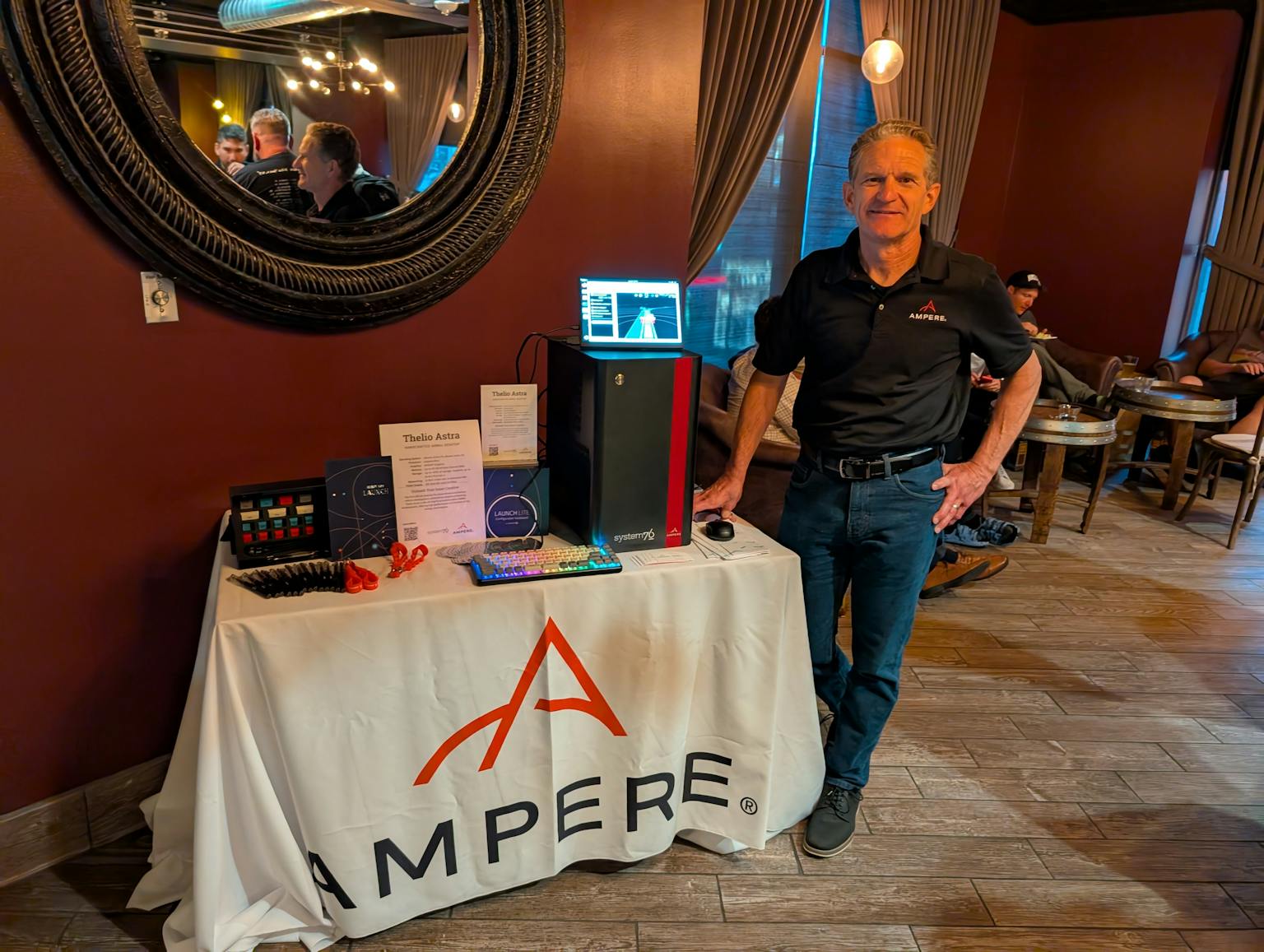 Ken from Ampere next to Thelio Astra and System76 Launch keyboard
