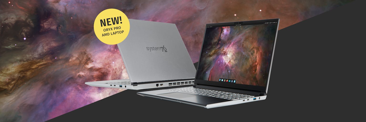 Front and back photos of the new Oryx Pro, lid open, featuring a silver aluminum exterior and Pop!_OS 24.04 LTS beta with the COSMIC desktop.