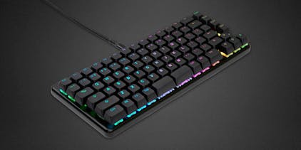 A beautifully handcrafted black aluminum keyboard with shine-through keycaps and customizable RGB LEDs.