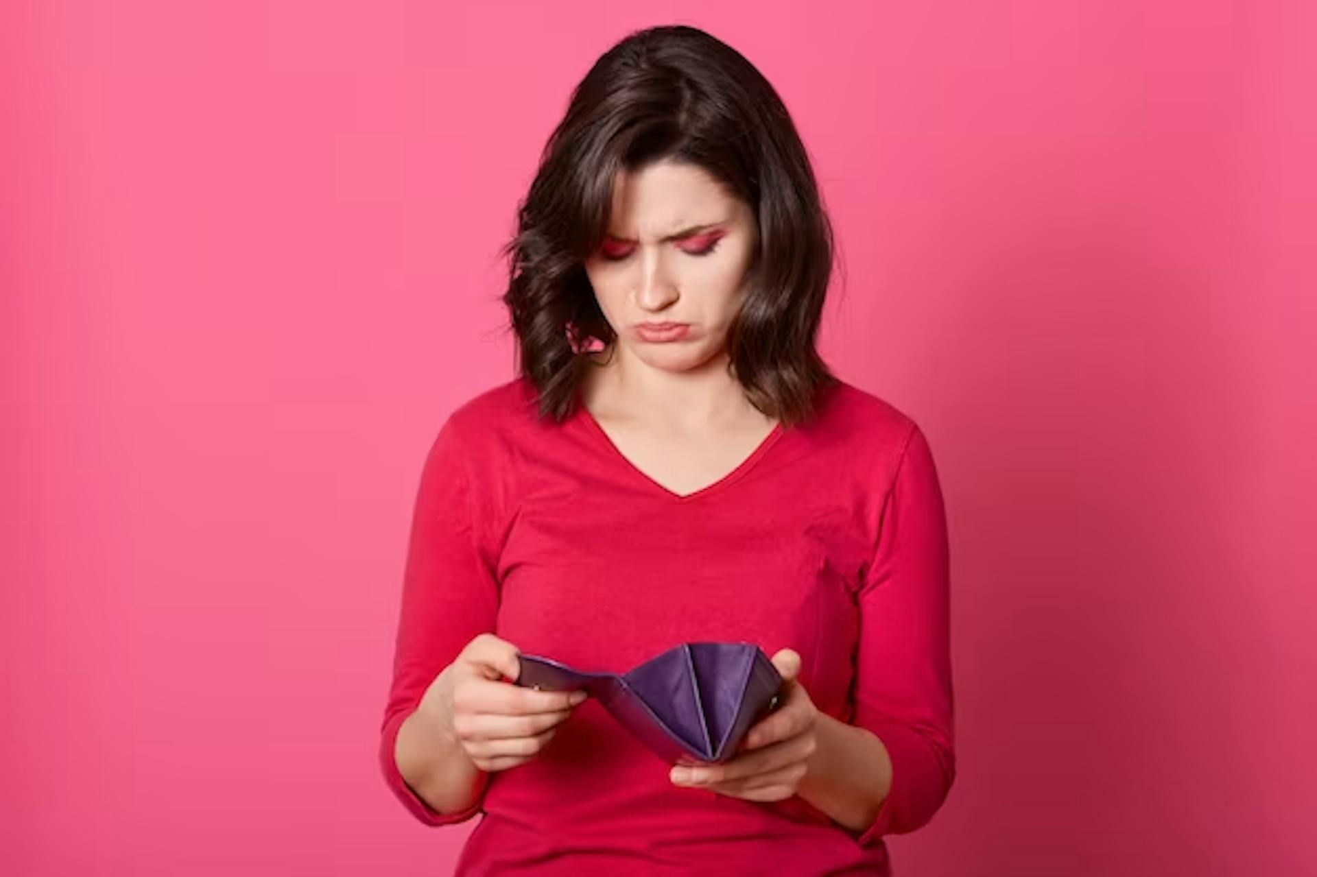 Woman with wallet in hand