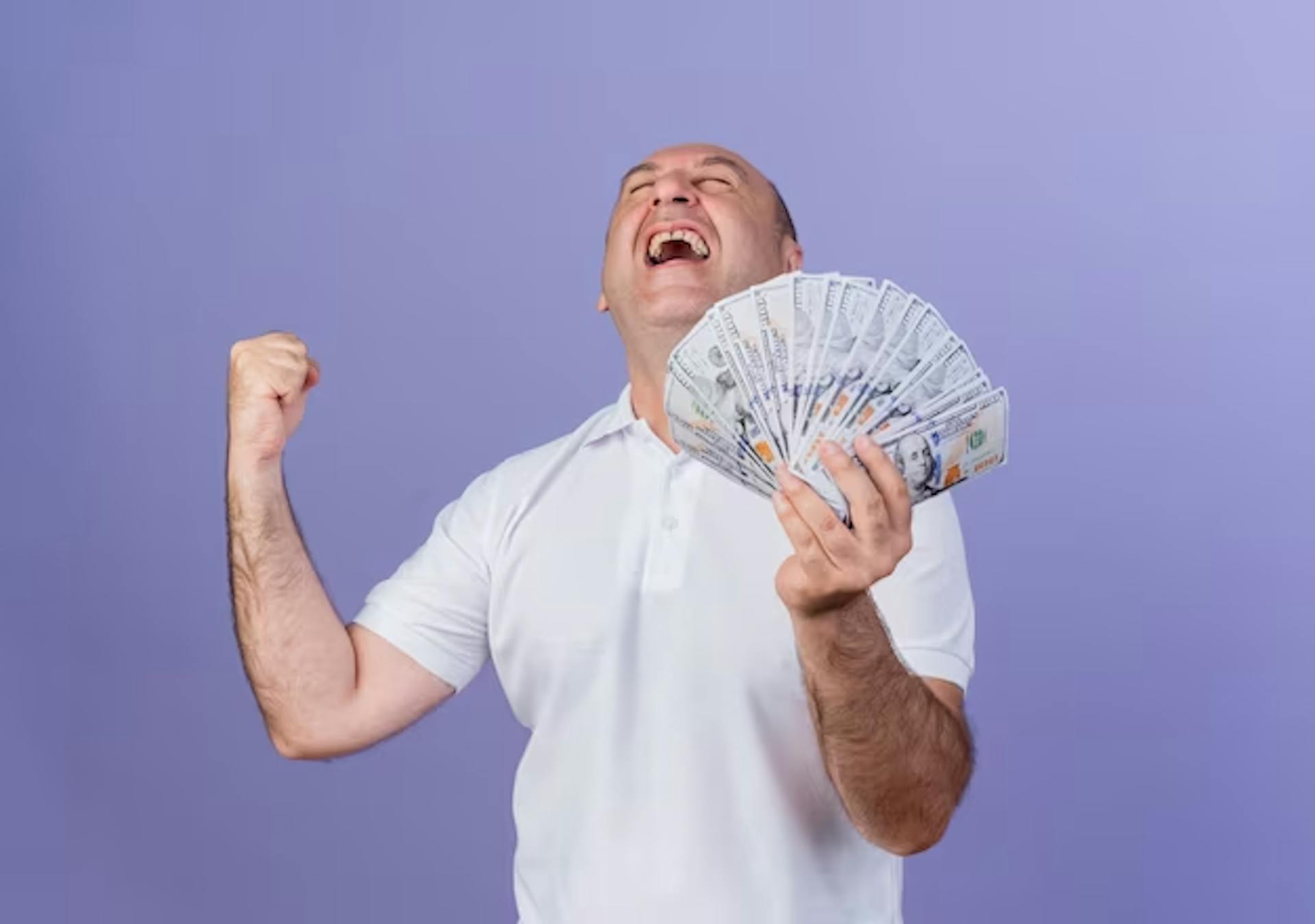 A surprised man with money