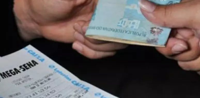 Lottery ticket and money