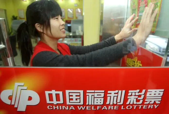 Woman checking lottery ticket