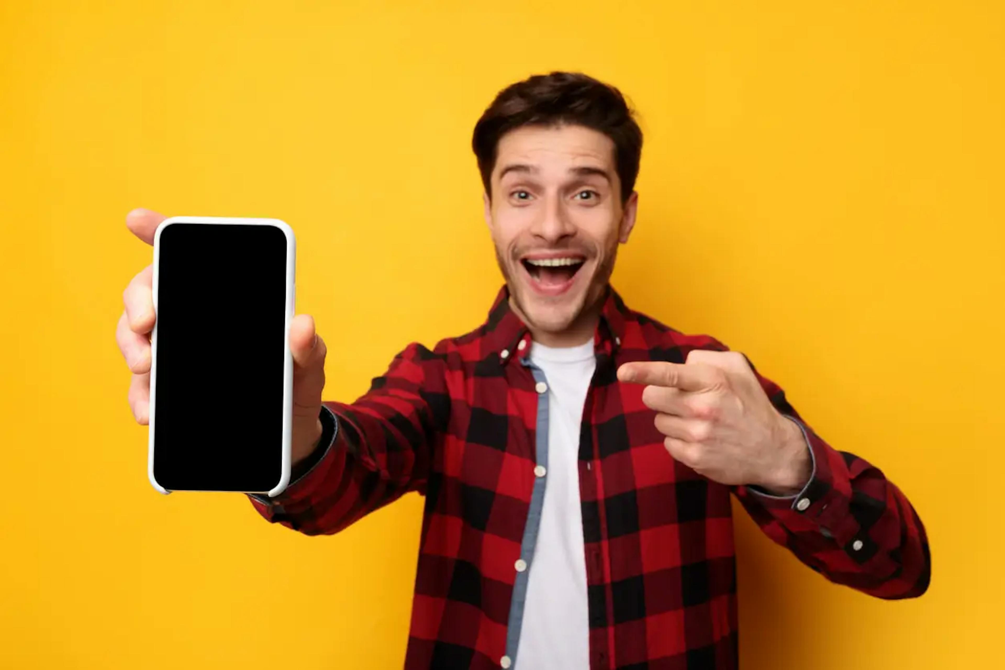 Man pointing to a cellphone