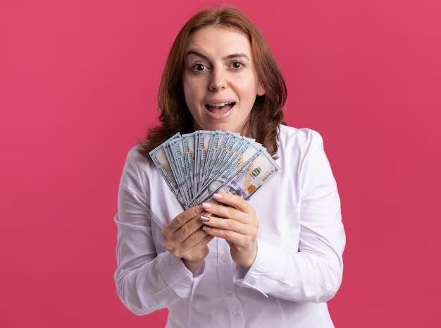 Woman holding money
