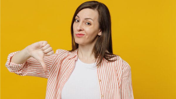 Woman giving a thumbs down